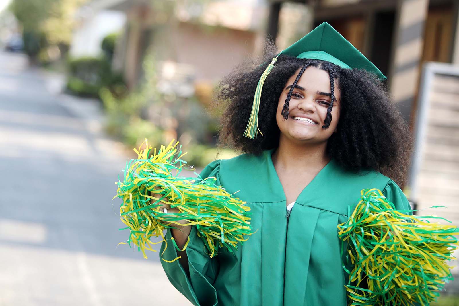 Smiling woman in graduation gown